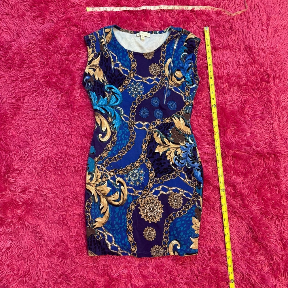 Nicky Minaj Elegant Blue and Gold Chain Print Dress with zipper details. B016